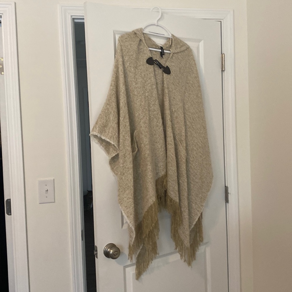 Shawl with hood and pockets
